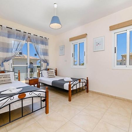 Blue Water Bay Villas พาราลิมนี ภายนอก รูปภาพ
