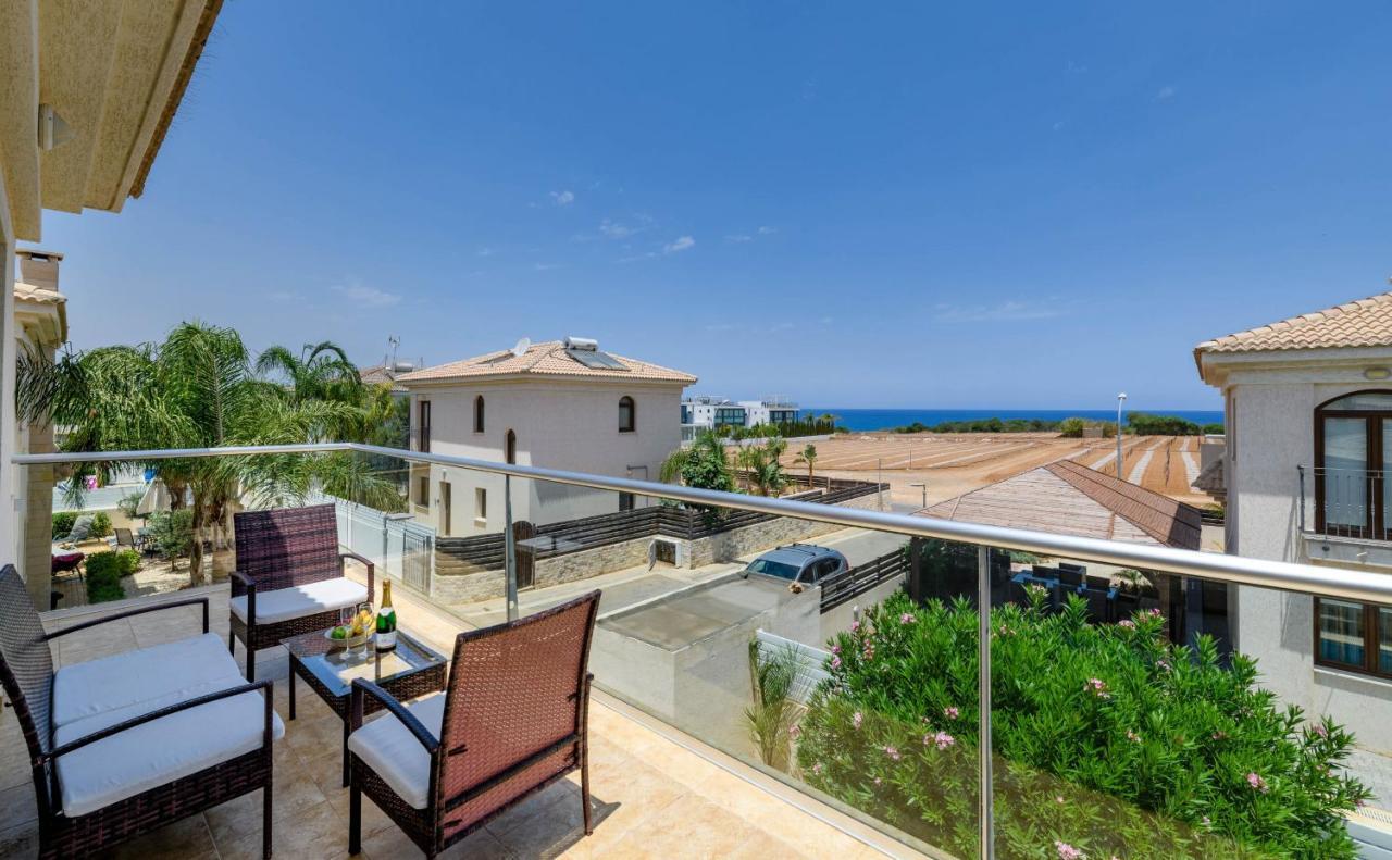 Blue Water Bay Villas พาราลิมนี ภายนอก รูปภาพ