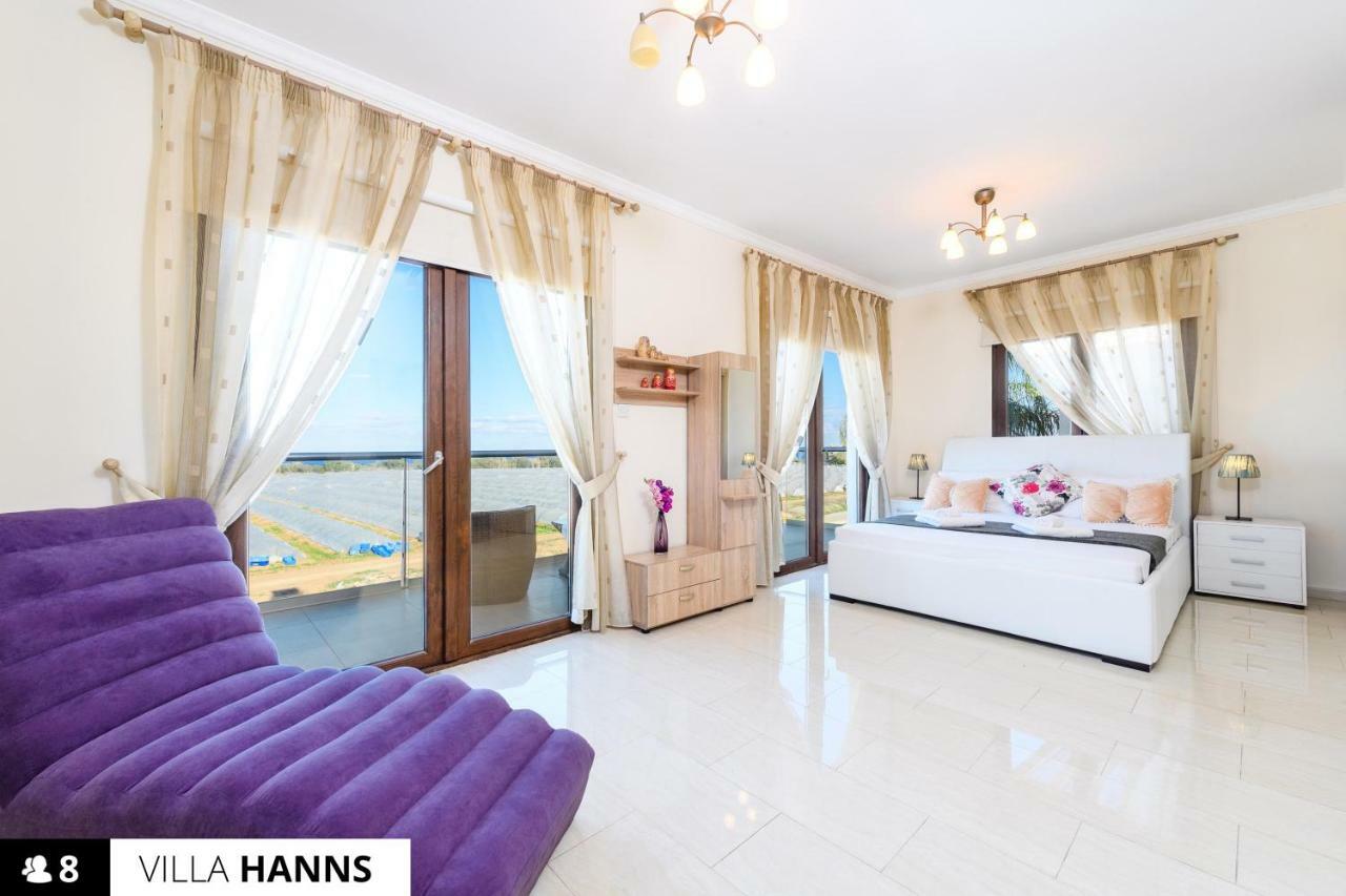 Blue Water Bay Villas พาราลิมนี ภายนอก รูปภาพ