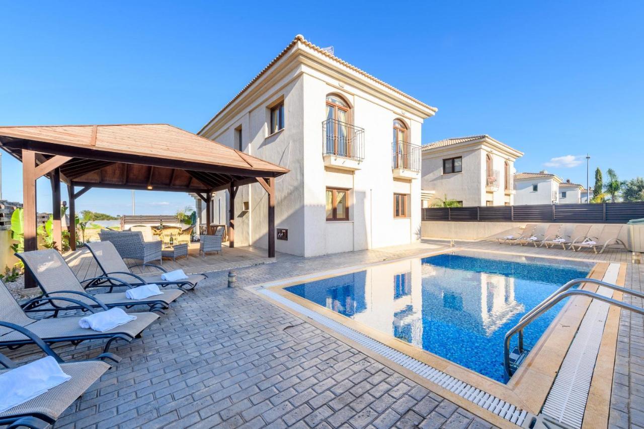 Blue Water Bay Villas พาราลิมนี ภายนอก รูปภาพ